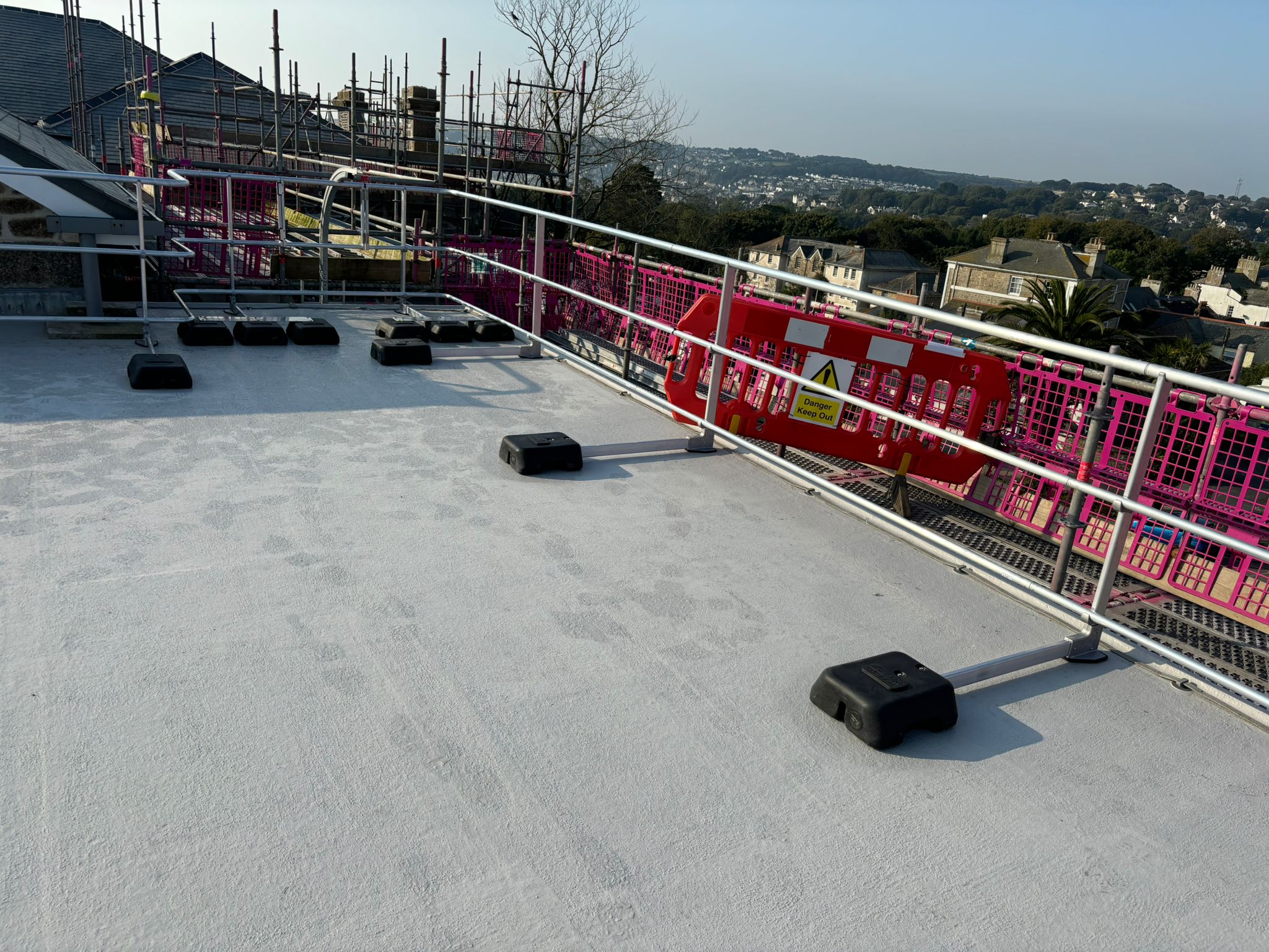 Mansafe System or Guardrails Choosing the Right Roof Fall Protection